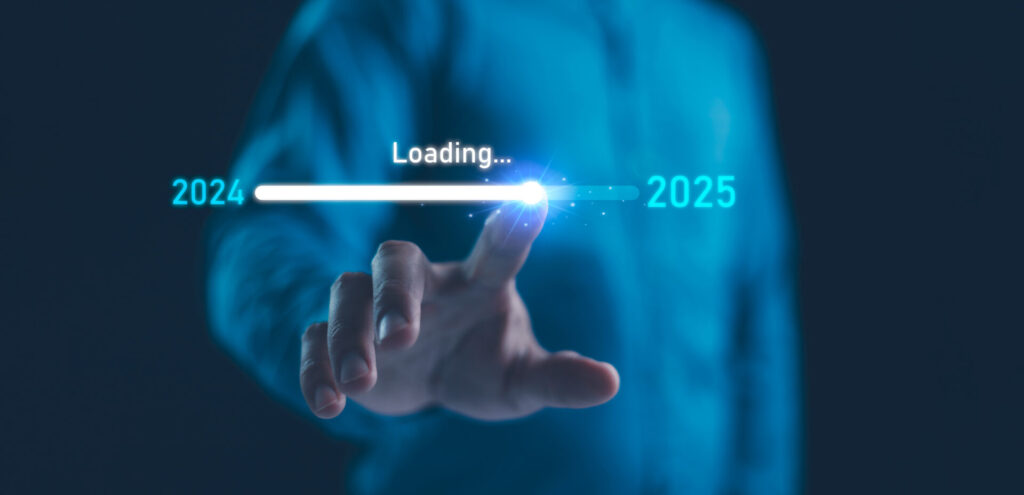 A picture of a man moving a dial from 2024 to 2025