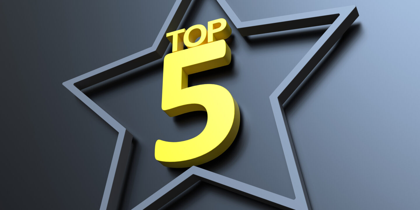 top five in yellow inside a star on a grey background